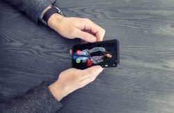 Adult man using dating app on mobile phone. Matching app concept